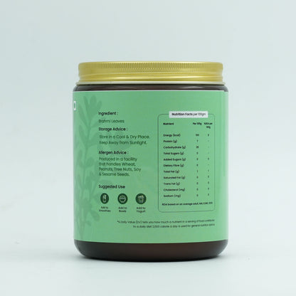 Close-up of Inspice Brahmi Powder showing its vibrant olive-green color and silky, clumpless texture